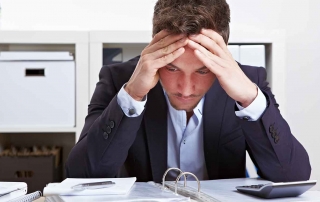 man stressed at work